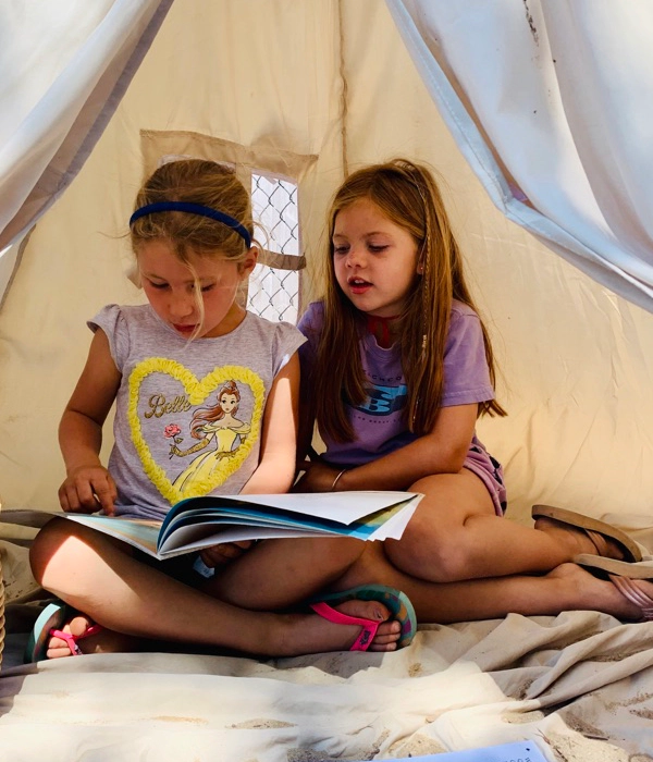 two kids reading a single book wellfleet MA